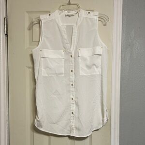 🛼🥁🧩 Calvin Klein white sleeveless blouse